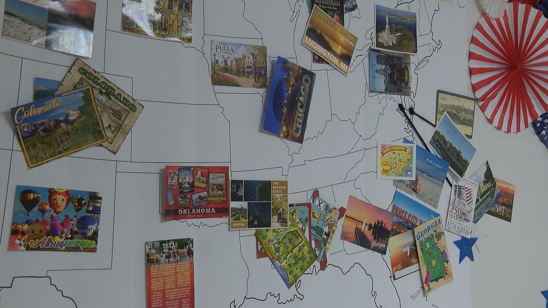 Elementary school students work to get postcards from all 50 states. Here’s how to help