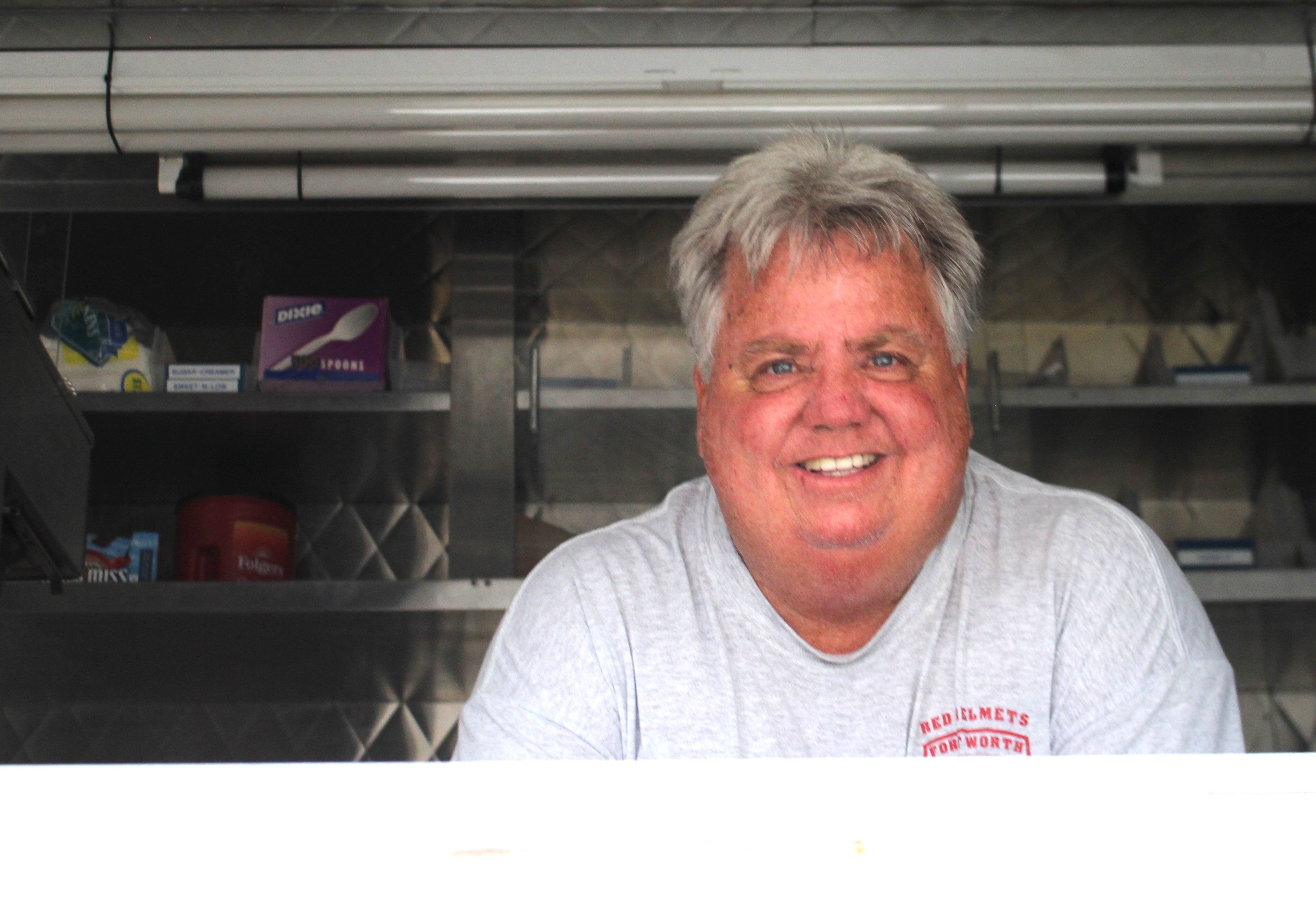 Fort Worth Fire Department volunteer brings refreshments for responders at incidents