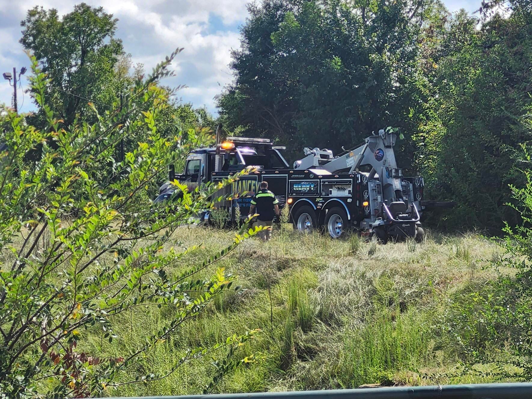 Man killed after lawn mower flips into canal, trapping him underwater