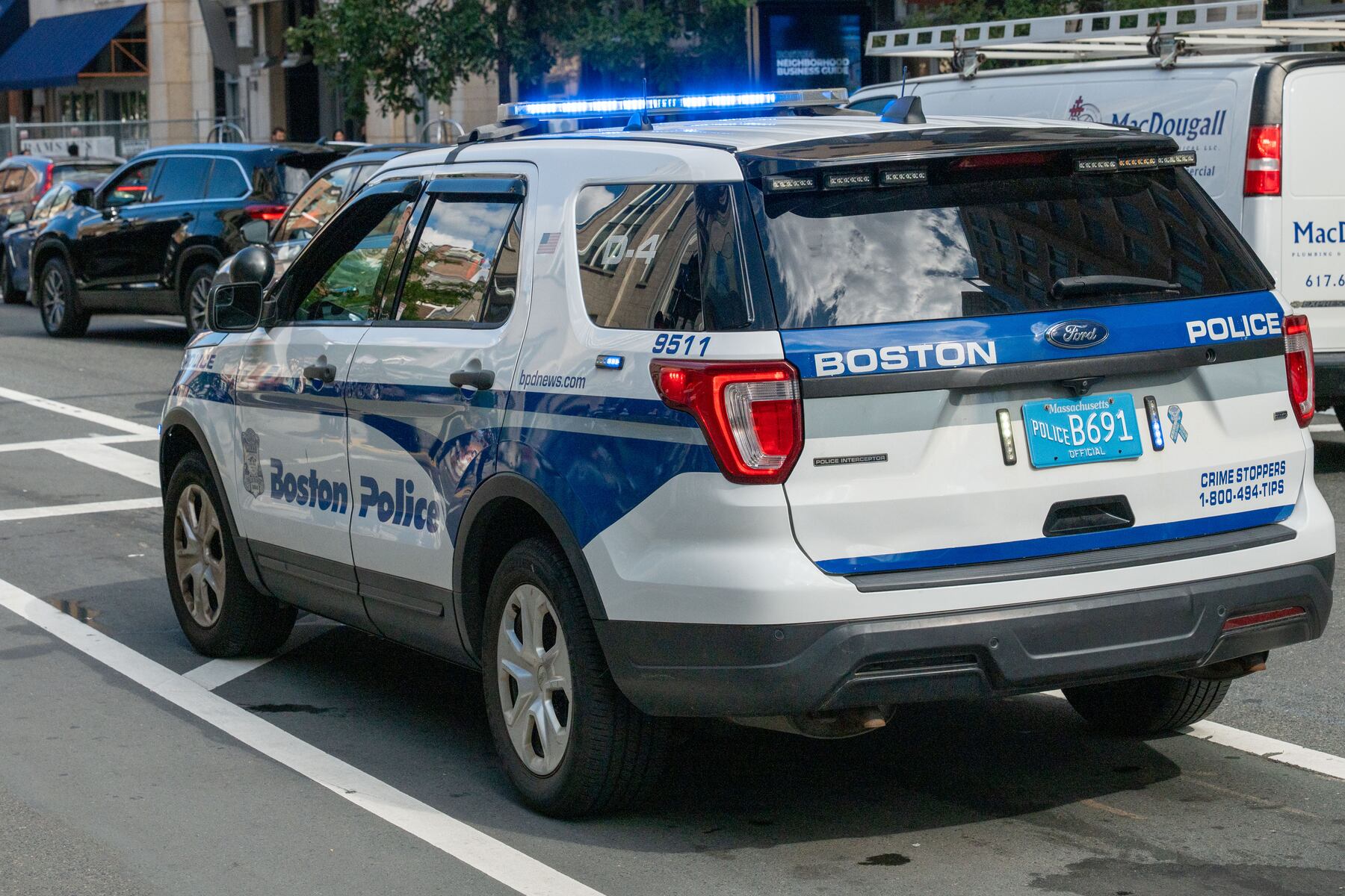 Dorchester woman arrested after slashing CVS shoplifter with knife, police say