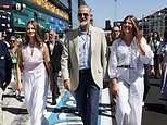 Queen Letizia's lookalike daughters Princess Leonor, 20, and Infanta Sofía, 19, look chic in matching white trousers and stylish blouses as they join King Felipe at Spanish Grand Prix