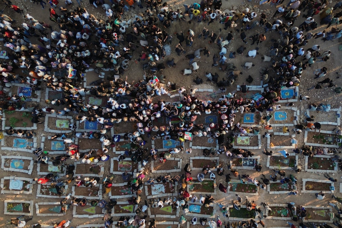 Photos of the funeral for victims of a deadly prison fire and riot in northern Syria
