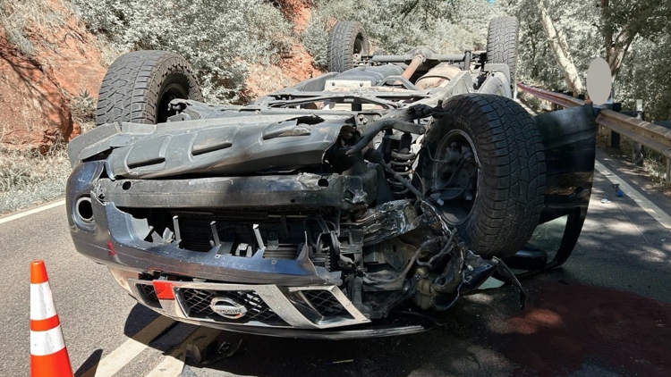 Distracted driver suffers minor injuries during rollover crash, DPS says
