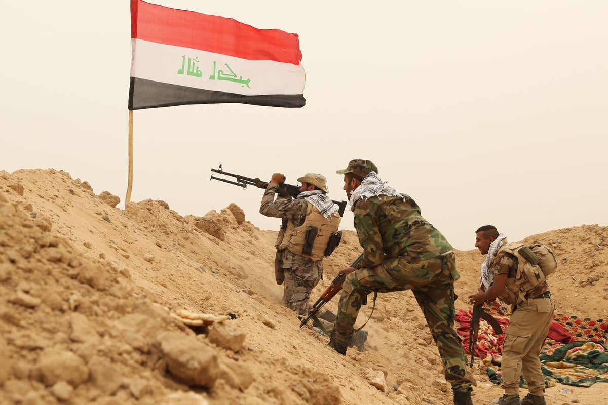 As the last US troops pack up in Iraq, militias signal their weapons will stay