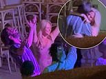 Emily Atack gets the party started at her Spanish wedding as she grabs the mic and kisses husband Alistair Garner during wild celebrations with her Rivals co-stars