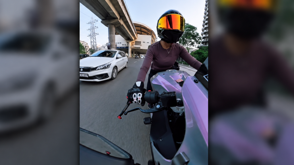 Indian police detain driver who hit female biker in viral video