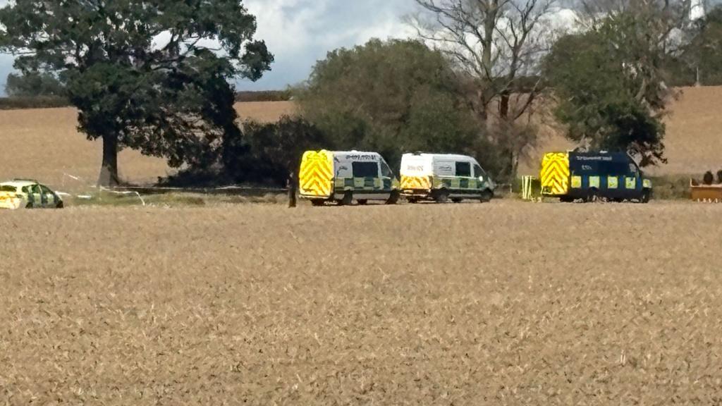 Police search land for woman murdered in 1995