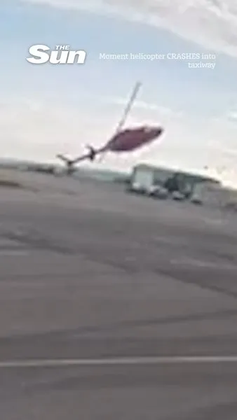 Moment helicopter CRASHES into taxiway