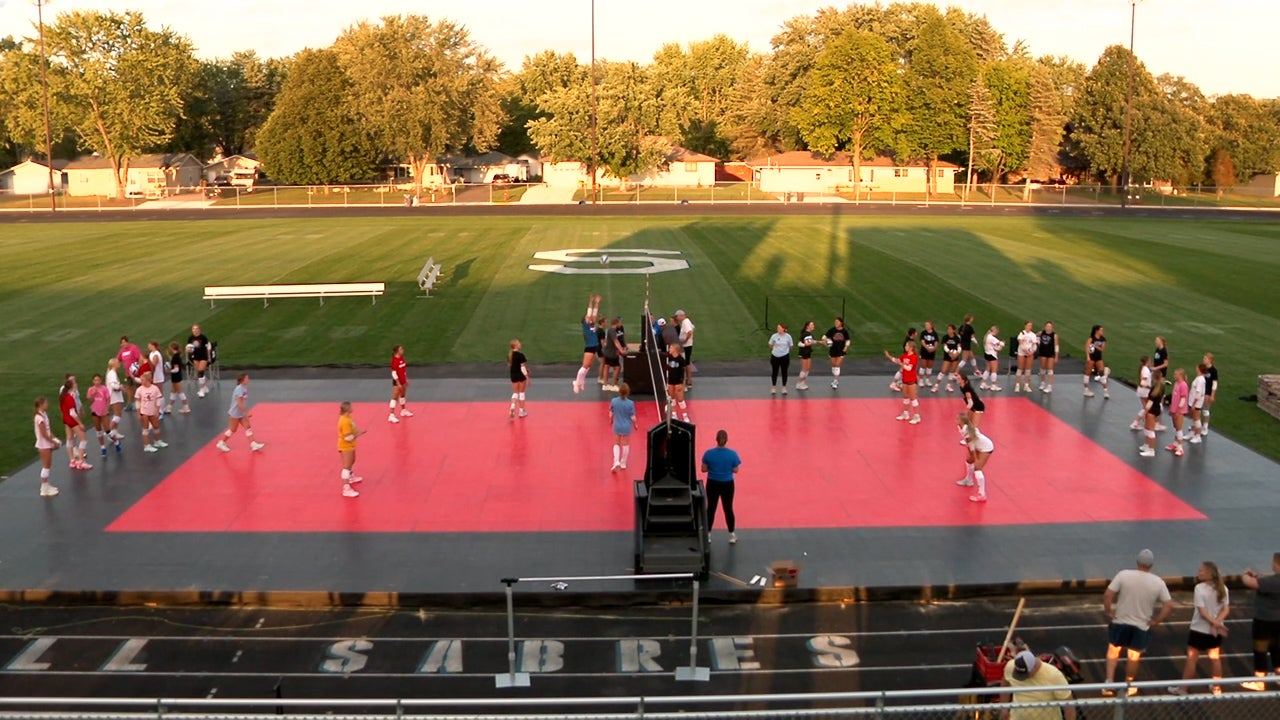 Sartell students, community build outdoor volleyball court for historic match