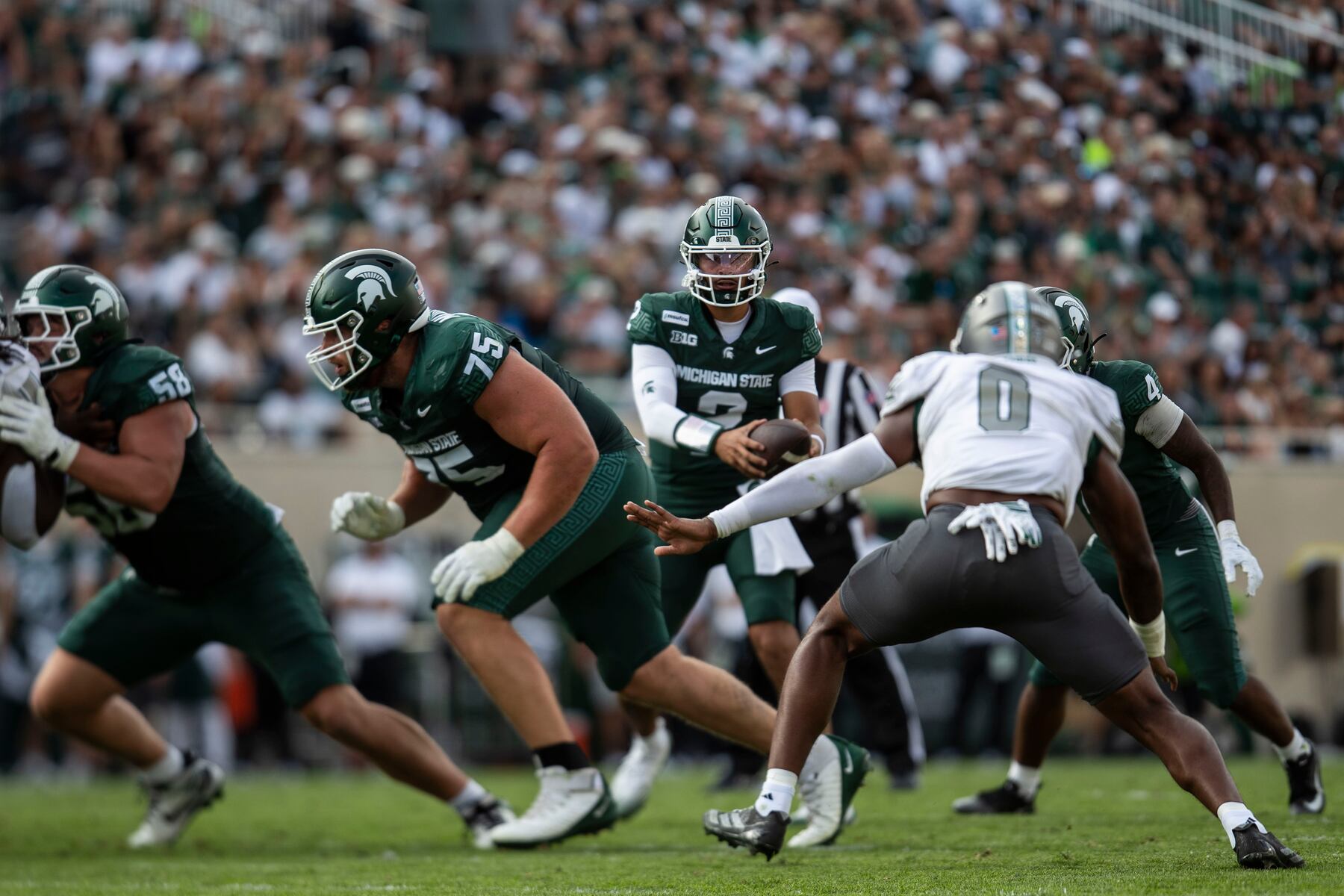 Michigan State QB living dream at fourth college in six years