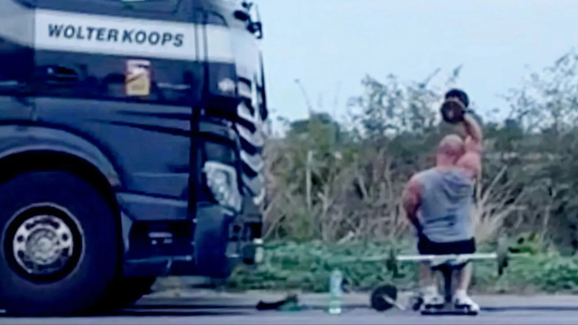 Bemused motorist spots lorry driver weight-lifting on A-road hard shoulder