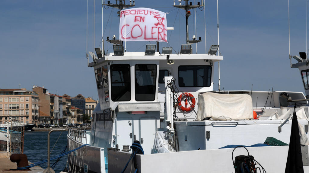 French fishermen blockade ports over soaring fuel costs as budget fight looms