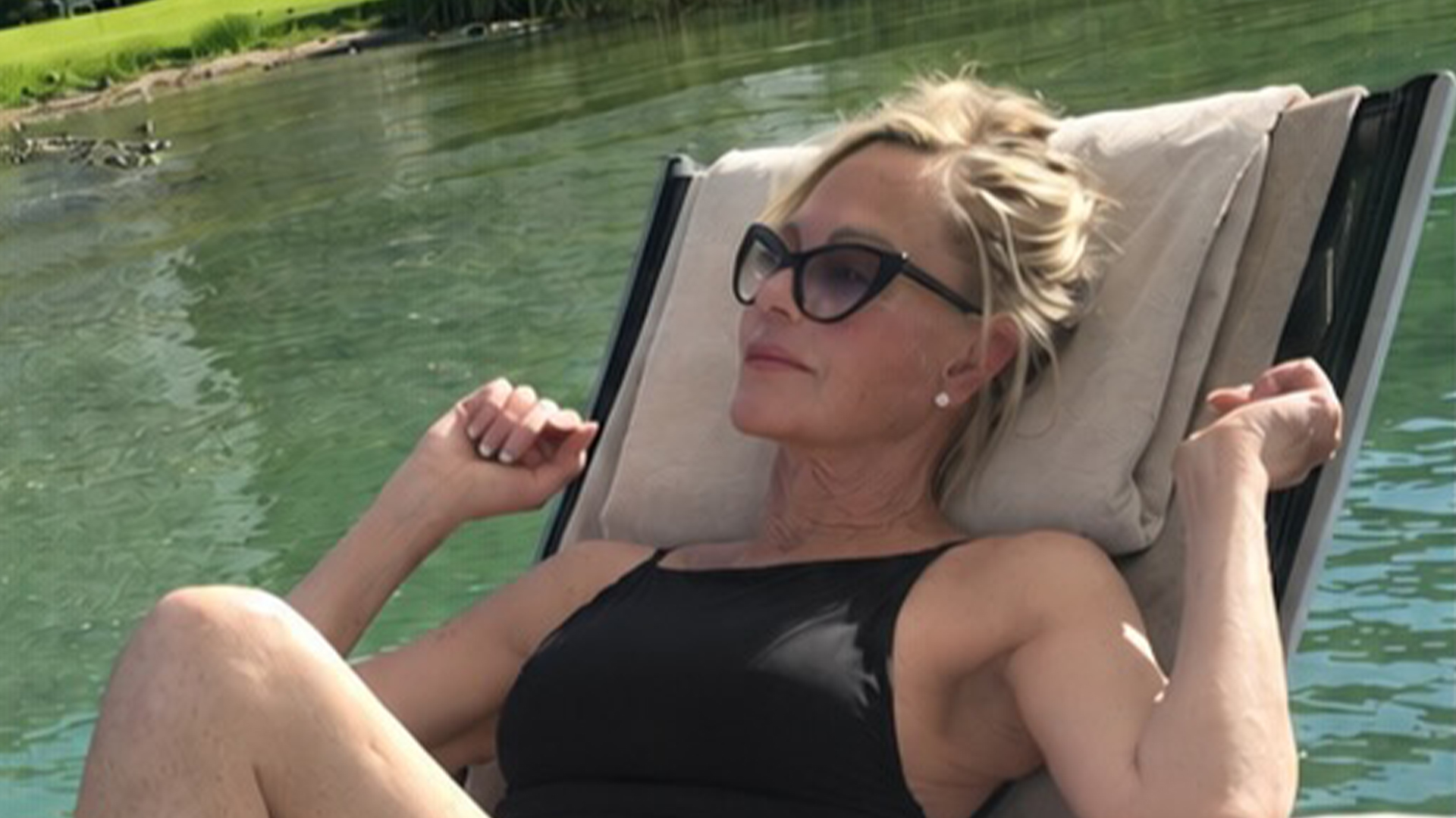 Melanie Griffith, 69, dares to bare in cheeky black swimsuit and shows off legs for days while sunbathing in Austria