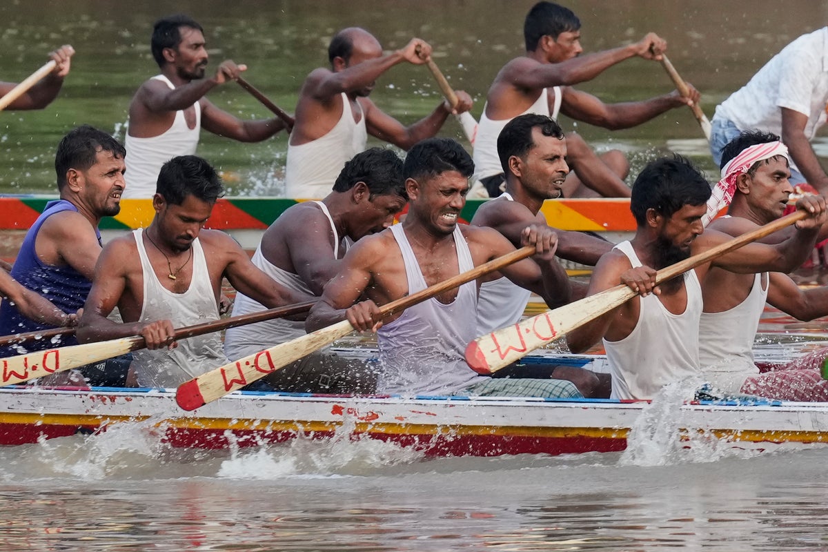 Photos of a boat race on India’s Kulsi River