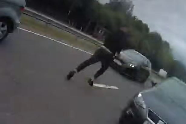 Moment man drives on wrong side during police chase before running into A-road