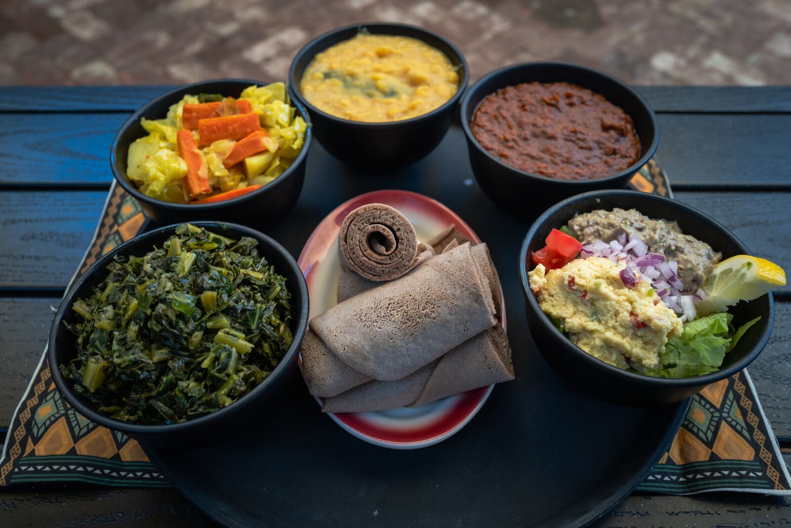 How tariffs, war, and supply chains collide in Cafe Colucci’s vegan combo