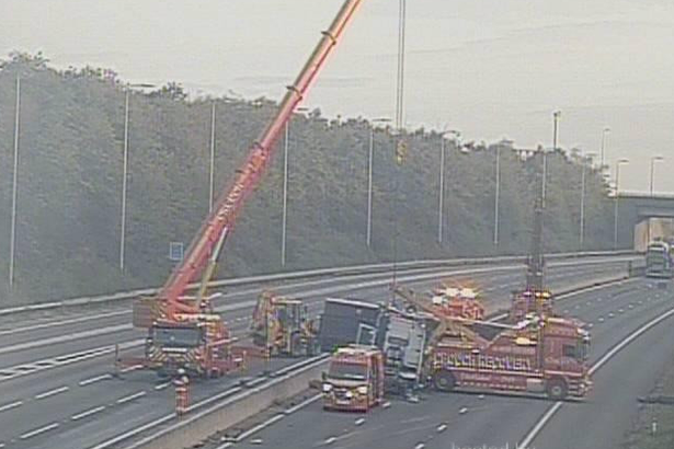 M1 traffic - live: Motorway at standstill near Junction 23 after lorry overturns