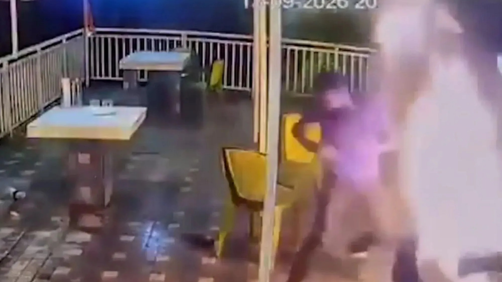 Terrifying moment newlywed bride is engulfed in flames on honeymoon as hotel worker pours liquid onto fire