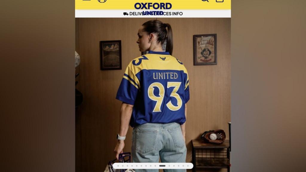 Oxford apologise for United 93 shirt advert