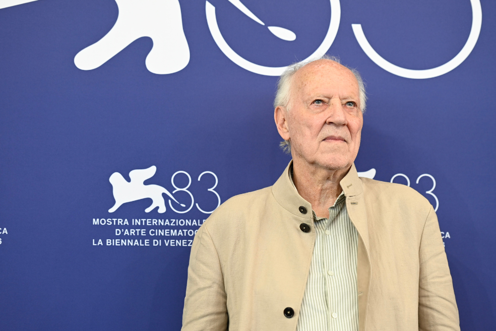 Werner Herzog and Orlando Bloom on ‘Bucking Fastard’ and That Threesome Scene With the Mara Sisters: ‘It Has Such Charm and Depth’
