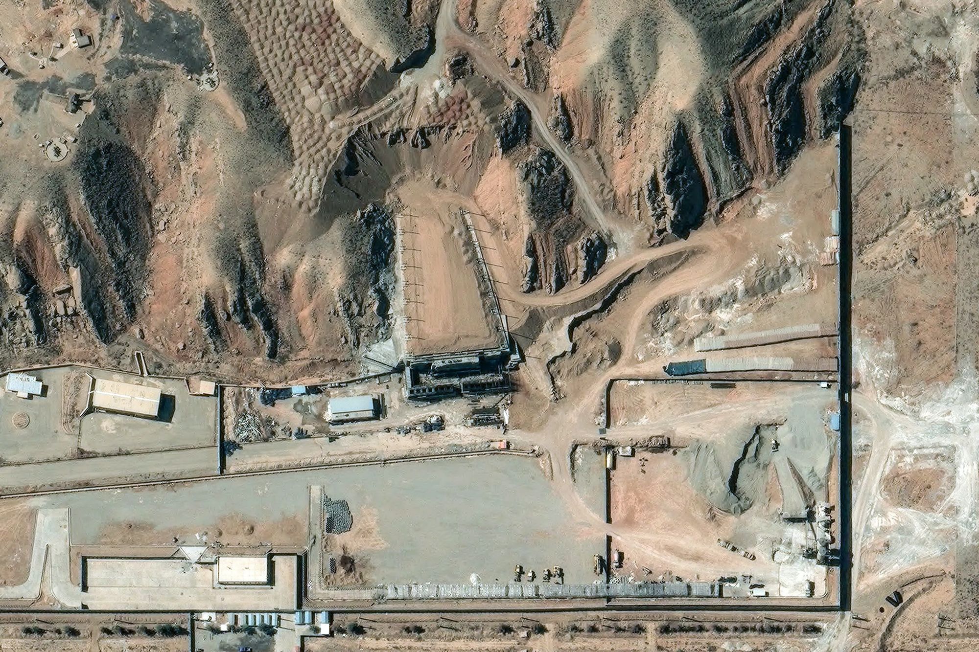 Satellite pictures show Iran rebuilding secretive nuclear base at alarming rate as Putin protects ally from monitoring