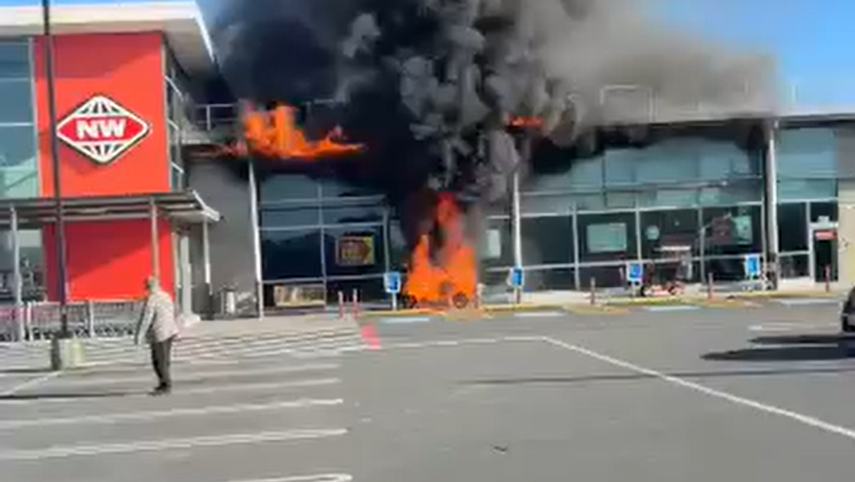 Mobility scooter fire sets supermarket facade alight