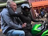 Moment 'inappropriate old man' jumps on primary school worker's motorbike and grabs her hips in front of his laughing pals