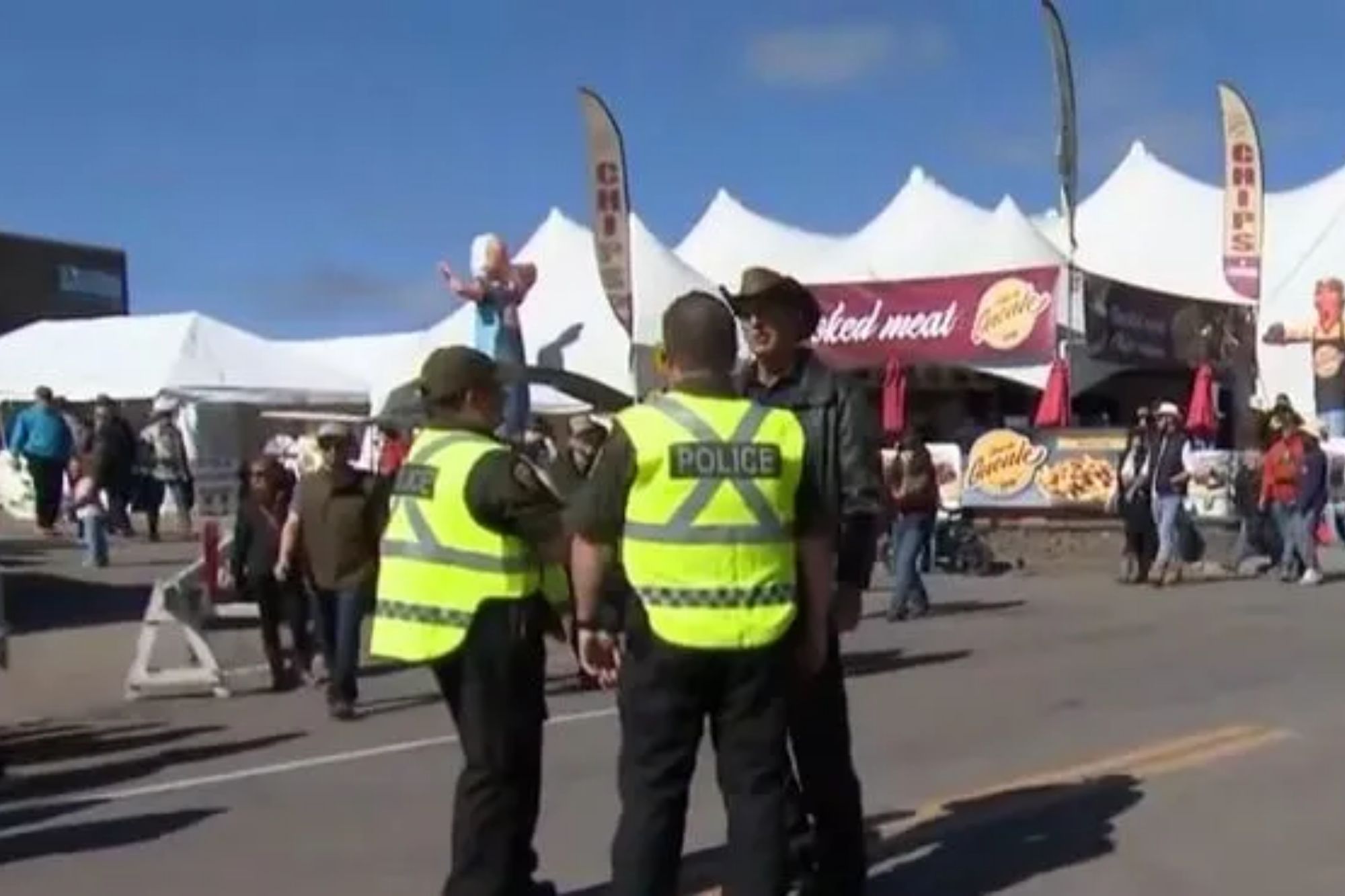 At least six injured after driver ploughs into festivalgoers in Canada as fleeing suspect arrested