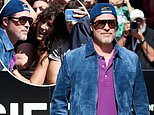 Brad Pitt is mobbed by fans as he arrives at San Sebastian Film Festival in Spain as friends reveal how marriage to Angelina Jolie sent his life 'spiraling'