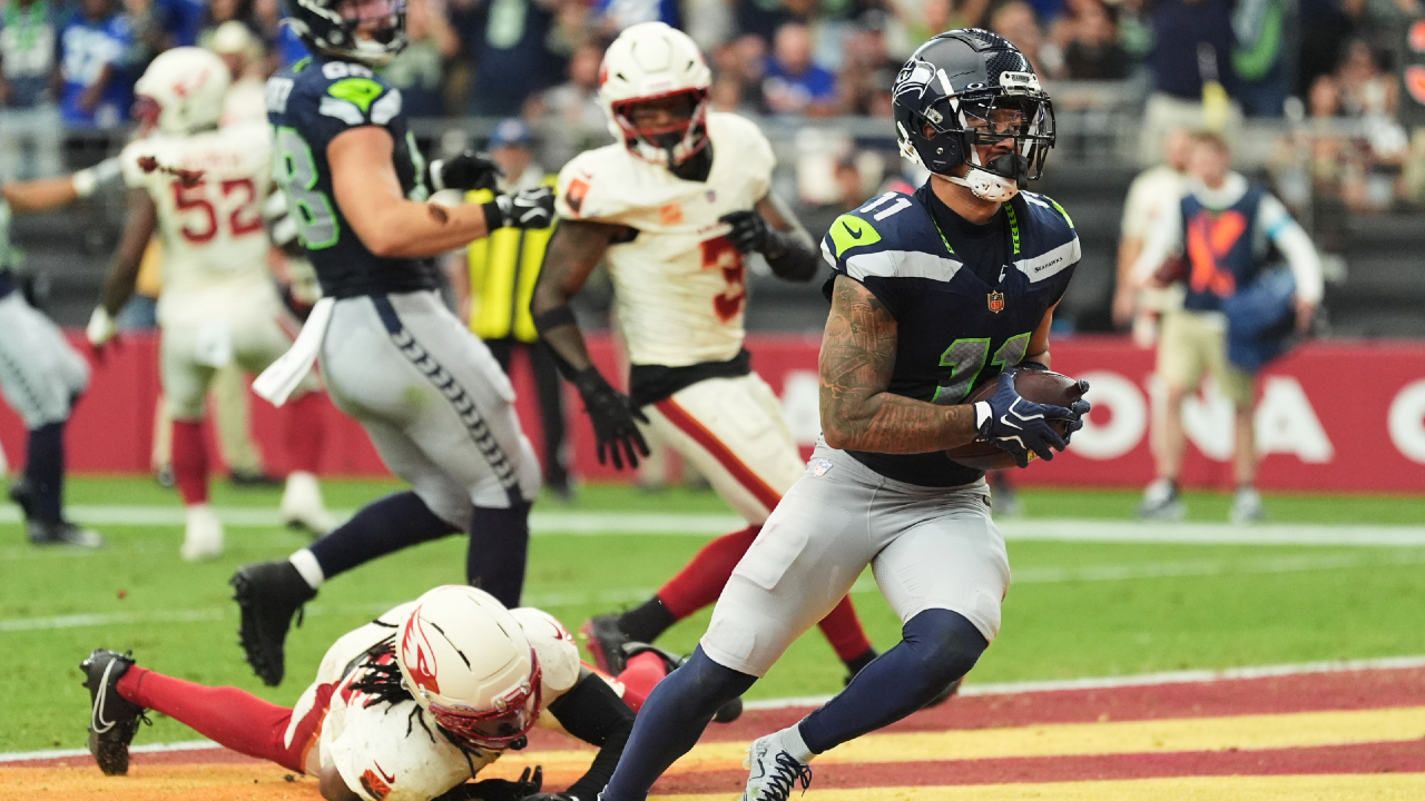 Lock connects for three TDs with Smith-Njigba, Seahawks roll past Cardinals