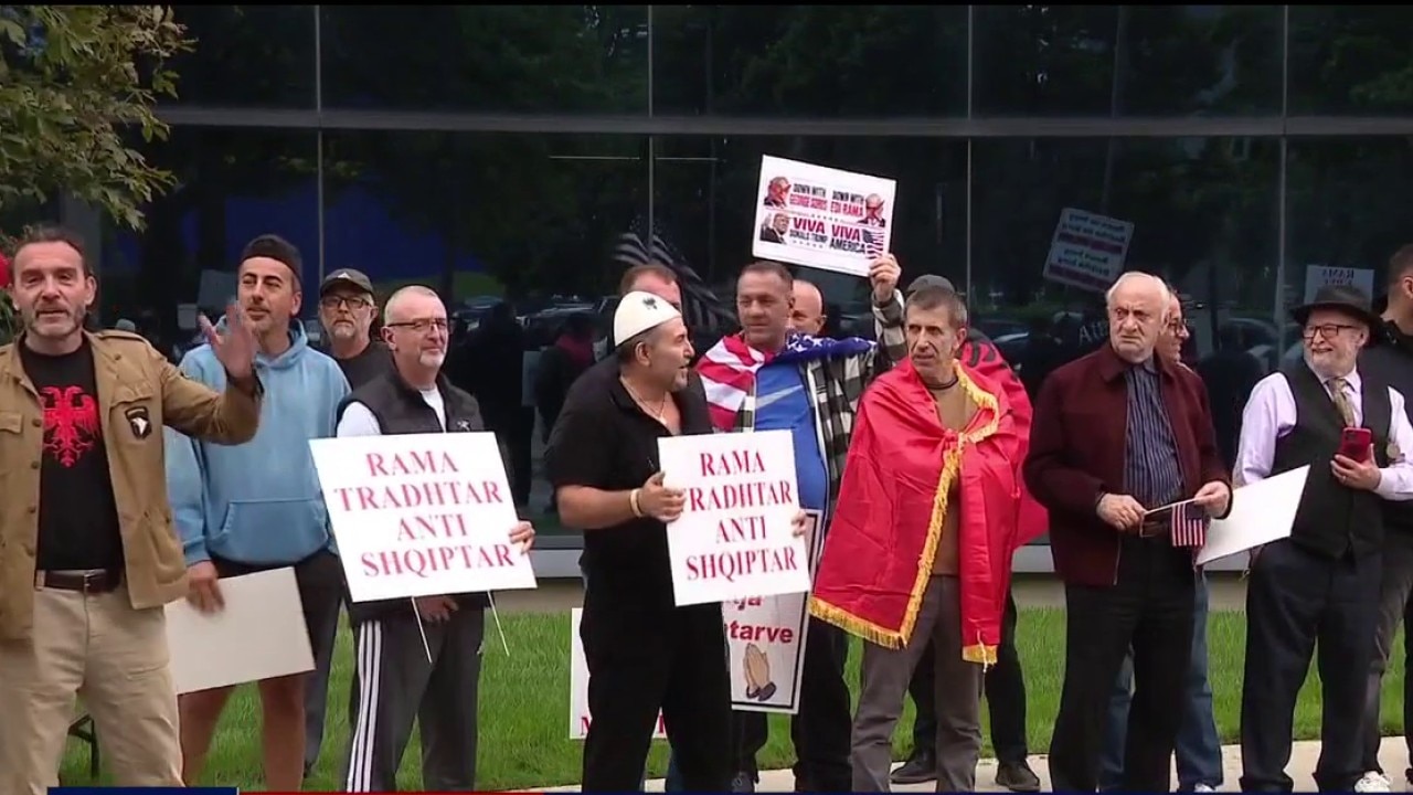 Albanian-American residents demonstrate outside of meeting with prime minister