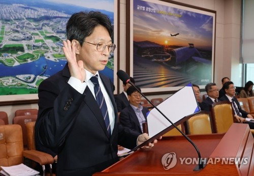 Confirmation hearing report adopted for land minister nominee