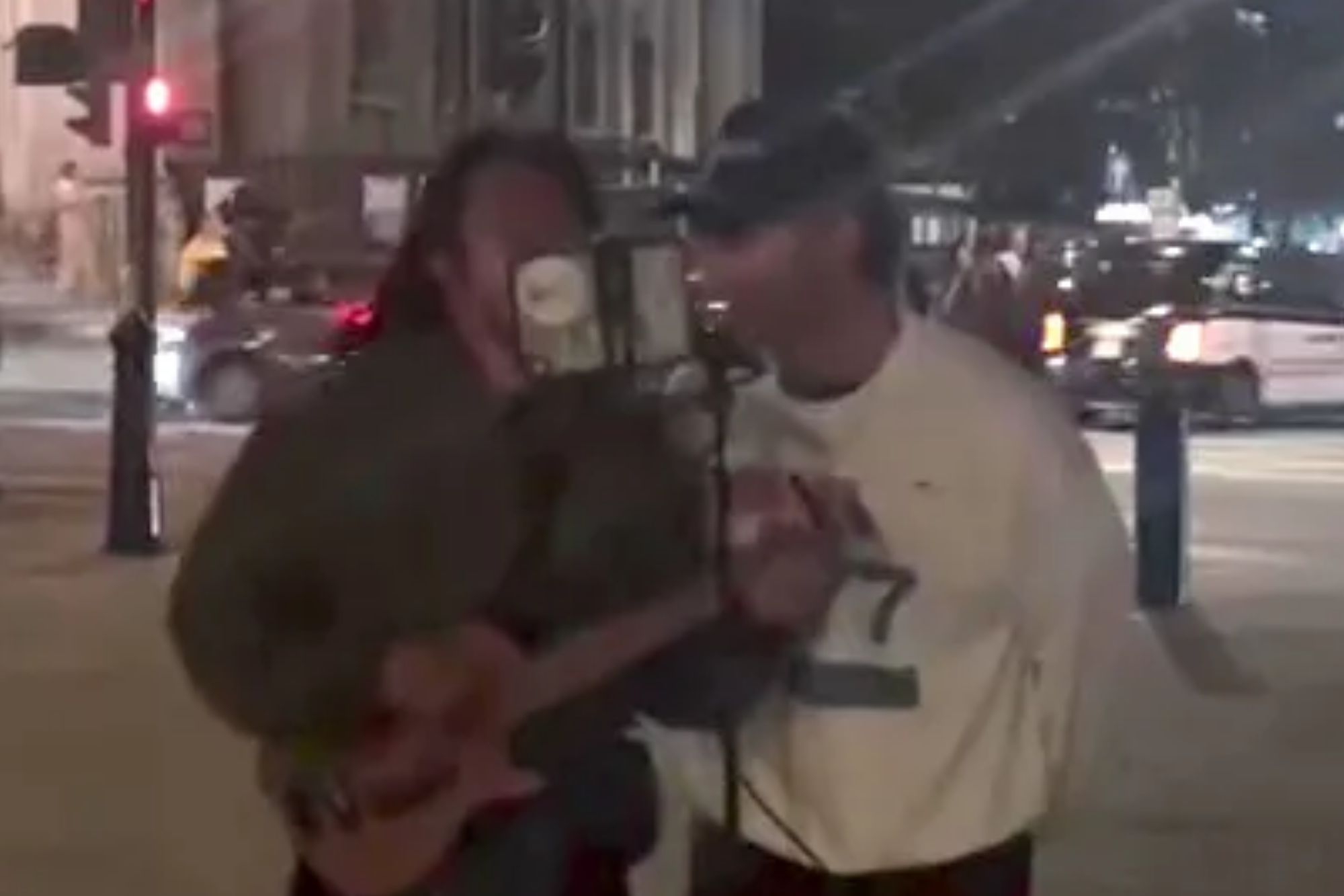Watch the sweet moment Coldplay’s Chris Martin surprises busker in Trafalgar Square and joins for duet of smash hit song