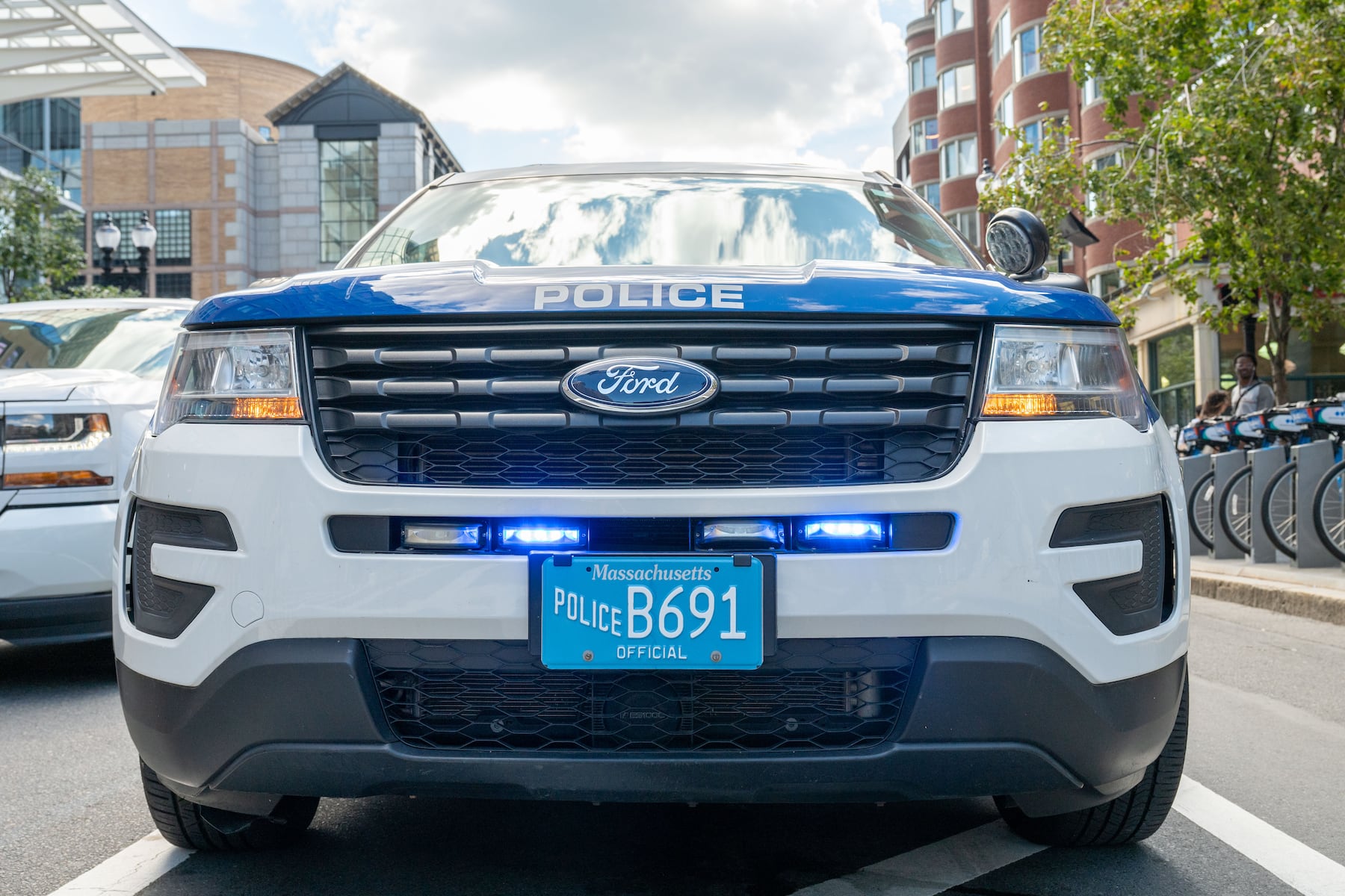 Motorcyclist crashes into Boston police cruiser while fleeing shooting scene, police say