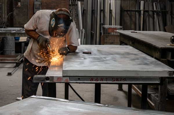 Tariffs, soaring fuel costs, and rising rates are squeezing U.S. manufacturers