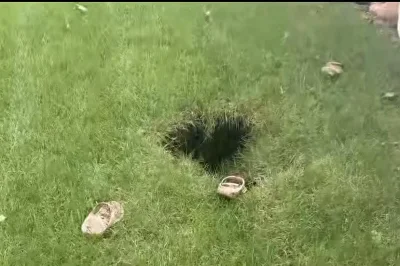 Watch: New York woman falls into backyard sinkhole on her birthday