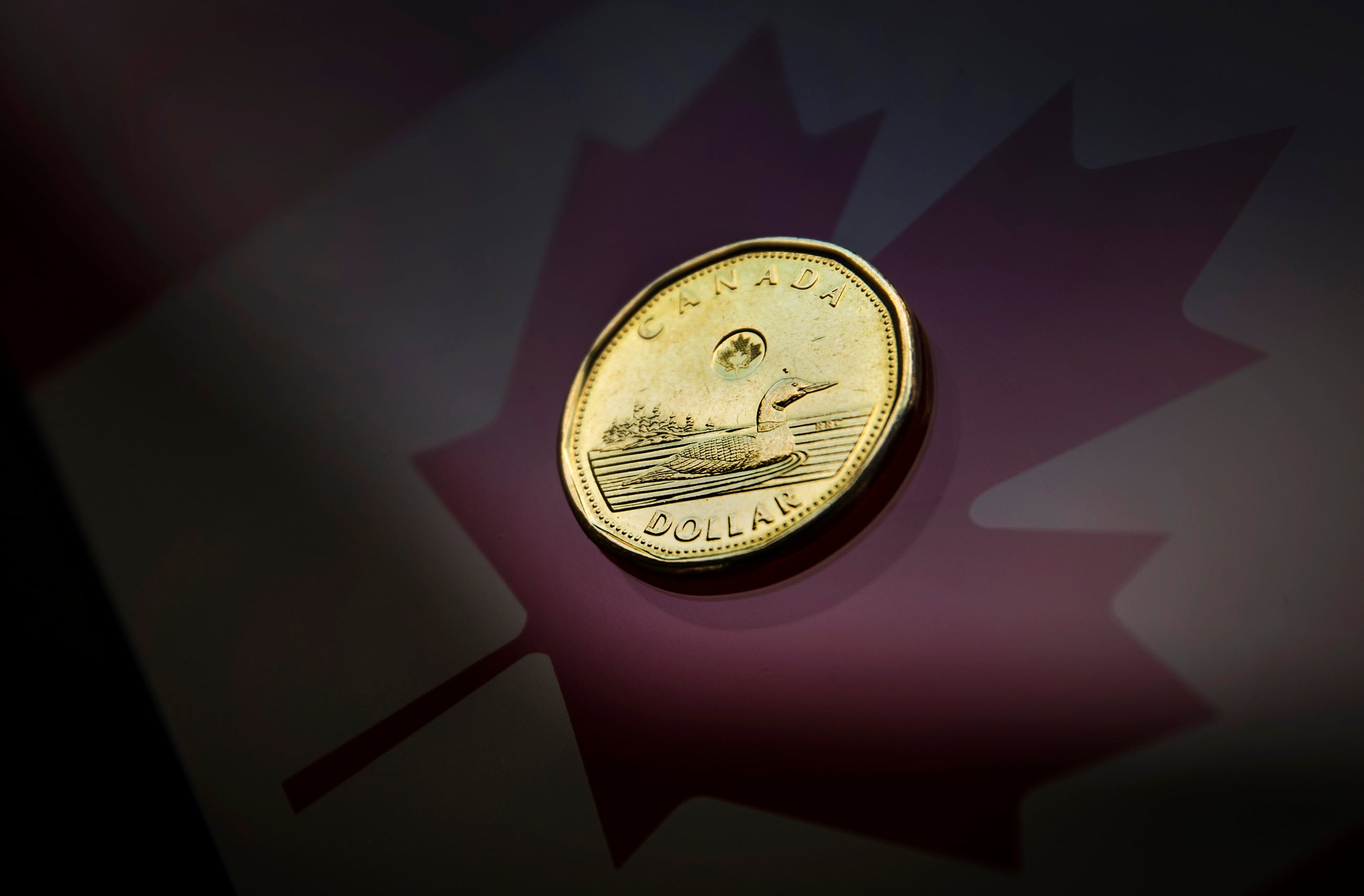 Canadian dollar hits nearly seven-week low on wider yield spreads