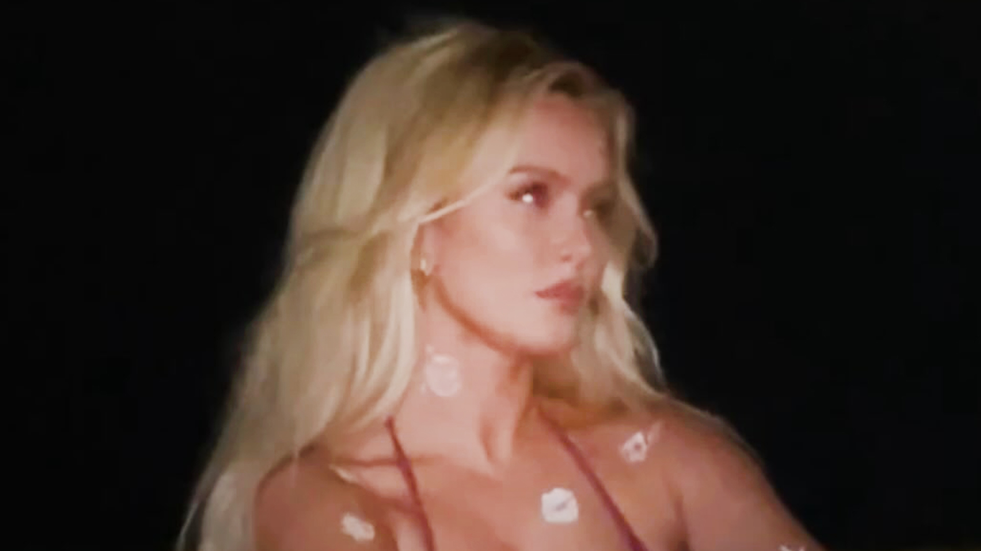 Zara Larsson looks out of this world in an electric purple bikini for extraterrestrial-themed beach photoshoot