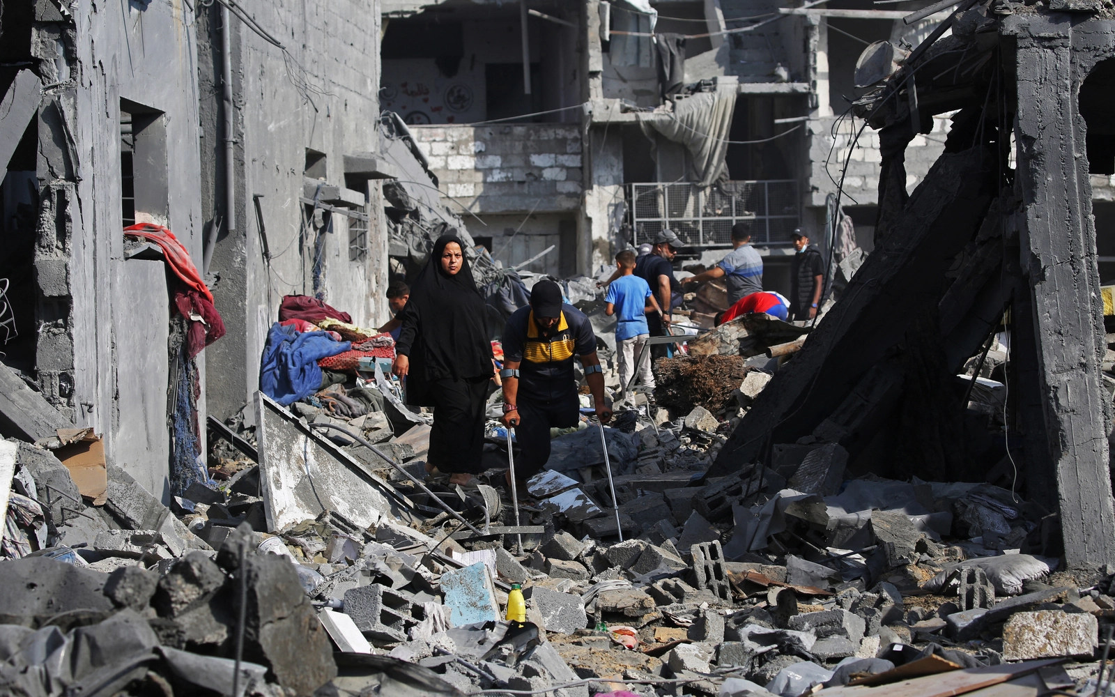 With reconstruction stalled, Gazans shelter in buildings at risk of collapse