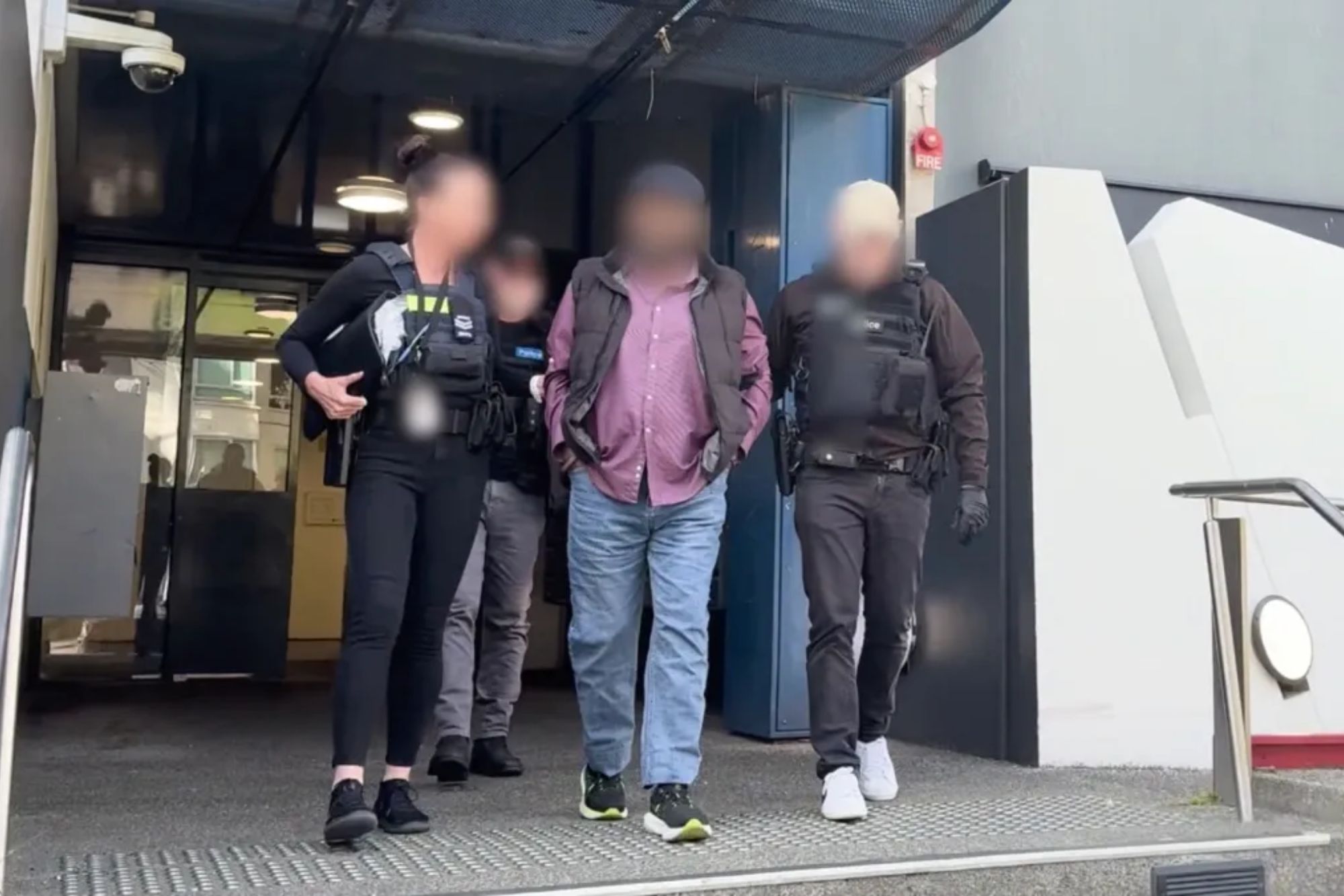 Australian man is accused of being Islamic State group propagandist who shared 10,000 files online