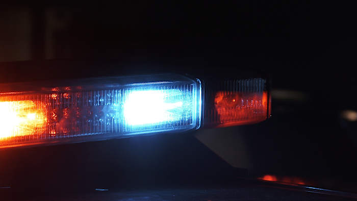 Man killed by officers in Lansing after reports of armed person banging on doors