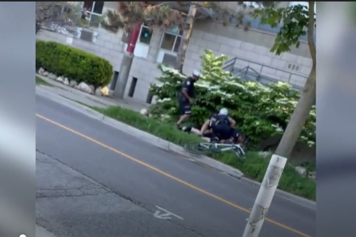 Police watchdog clears officer who tackled Toronto cyclist after ignoring stop sign