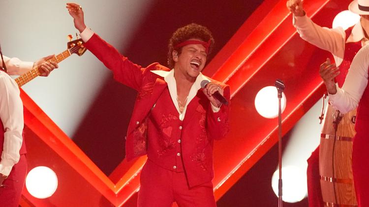 What to know before you head to Bruno Mars' downtown show, including parking costs and Alamodome bag policy