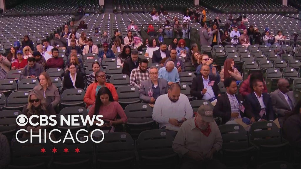 Dozens become naturalized American citizens at Wrigley Field