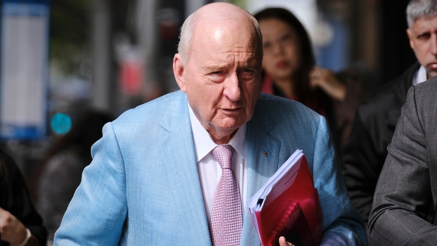 Jones greeted athlete with 'slap on the bottom', ex-butler tells court