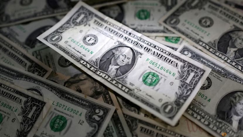 Dollar hovers near 2-month peak, Swiss Franc falls, Norwegian crown rises