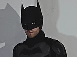 Holy handbags! Partygoer dressed as Batman saves the day when he catches bag snatcher in the street
