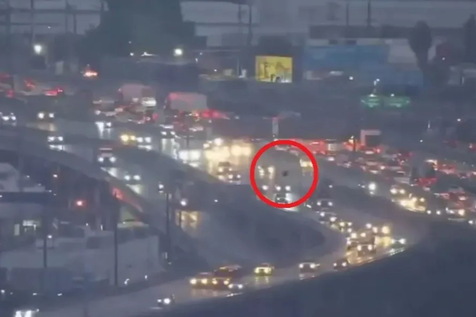 Mysterious orb caught on video flying over Los Angeles in traffic broadcast