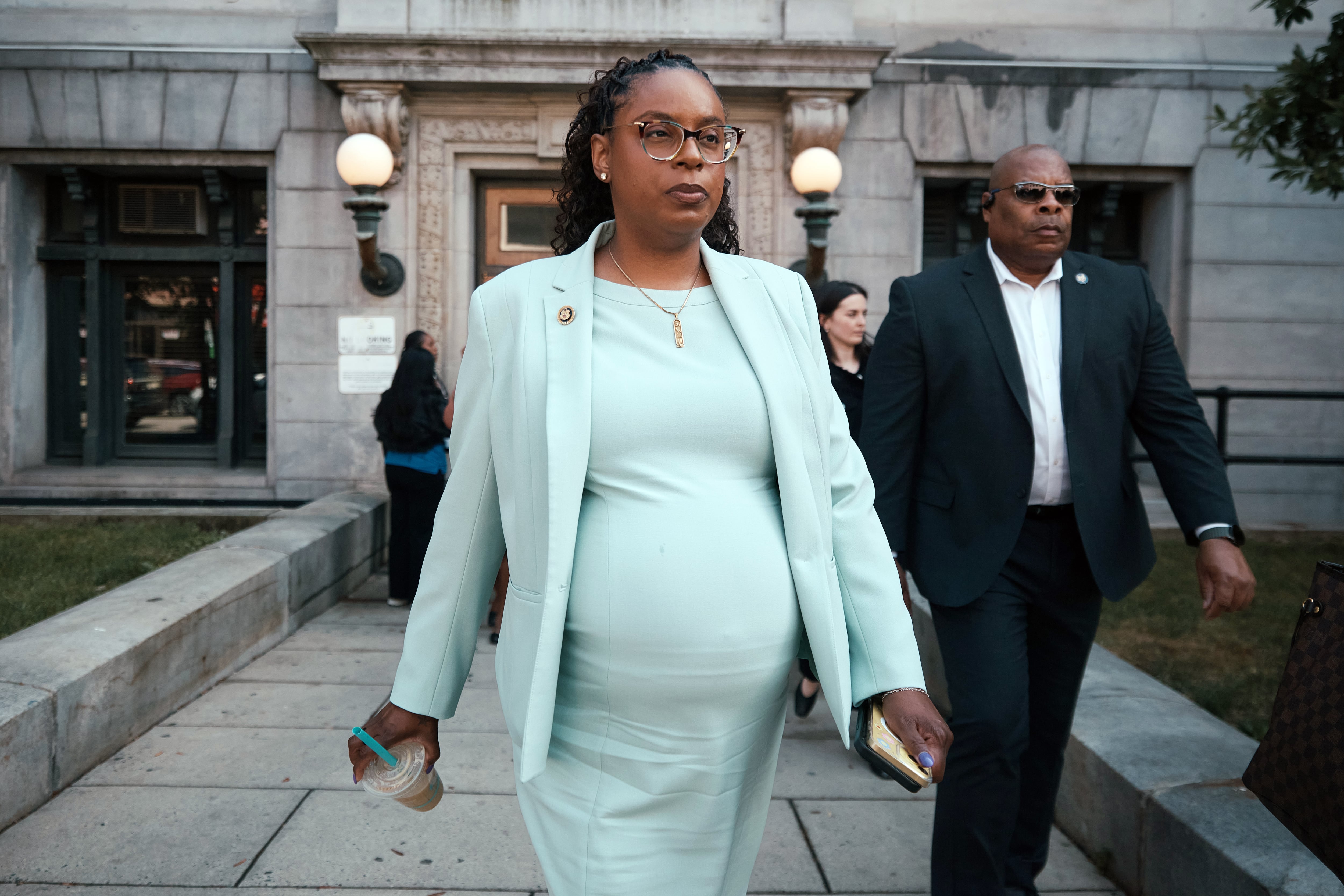 U.S. Rep. LaMonica McIver is eight months pregnant and — after a skirmish with ICE — facing 17 years in jail