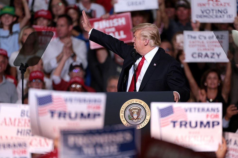 Former cult member details top signs America is being run by a cult leader